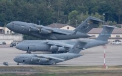 A US military aircraft takes off from the US Airbase Ramstein, Germany, June 7, 2020.