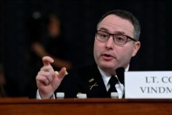 FILE - Then-National Security Council aide Lt. Col. Alexander Vindman testifies before the House Intelligence Committee on Capitol Hill in Washington, Nov. 19, 2019.