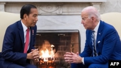 US President Joe Biden hosts a bilateral meeting with Indonesian President Joko Widodo, in the Oval Office of the White House in Washington, DC, on November 13, 2023.