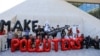 Activists protest during COP28 in Dubai, United Arab Emirates, Dec. 10, 2023. Taiwan, with per capita emissions among the highest in the world, is blocked from participating in the summit. However, a Taiwanese official says Taiwan is willing to donate to a climate damage fund.