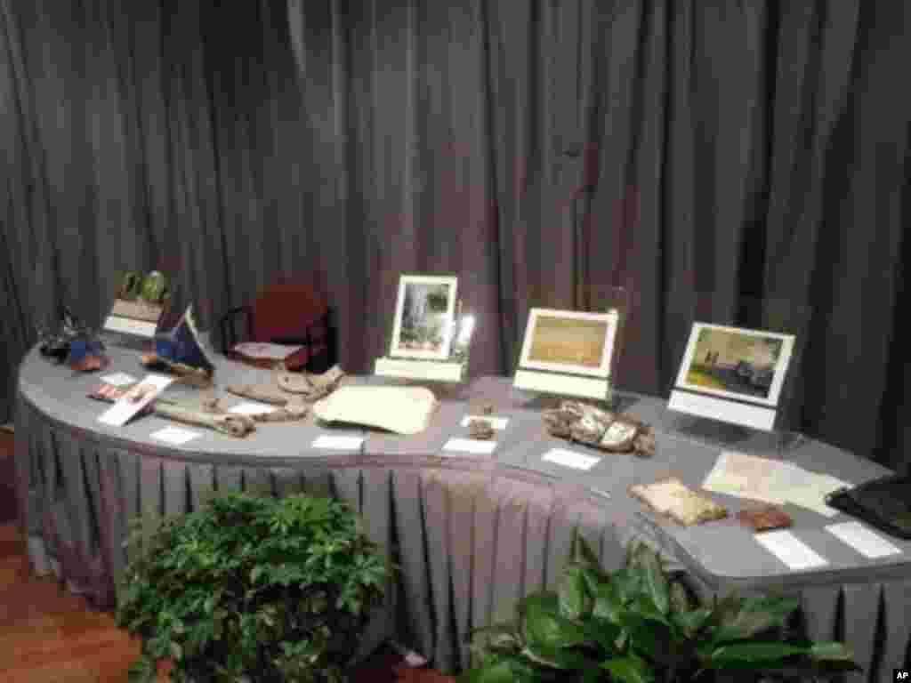 The Pennsylvania display table presents objects from the 9/11 terrorist attack on Flight 93, which crashed into a field in Shanksville, Pennsylvania.