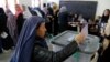 Millions of Afghans Vote Despite Attacks, Threats 