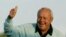 Obit-Arnold Palmer: File- This April 5, 2007, file photo shows former Masters champion Arnold Palmer acknowledging the crowd after hitting the ceremonial first tee shot prior to the first round of the 2007 Masters golf tournament at the Augusta National Golf Club in Augusta, Ga. Palmer, who made golf popular for the masses with his hard-charging style, incomparable charisma and a personal touch that made him known throughout the golf world as "The King," died Sunday, Sept. 25, 2016, in Pittsburgh. He was 87. 
