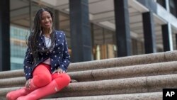 Arlene Pitterson poses for a photo in New York, April 4, 2018. Council-member Rafael Espinal has proposed legislation that would bar employers from requiring employees to check and respond to non-emergency emails, texts and other electronic communications sent outside of regular work hours, or retaliating against them if they didn’t. The bill would be intended to make life better for people like Pitterson, a marketing and event planning consultant in Brooklyn, who recalled one boss routinely pestering her with late-night emails, then grew upset when she didn’t reply.
