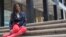 Arlene Pitterson poses for a photo in New York, April 4, 2018. Council-member Rafael Espinal has proposed legislation that would bar employers from requiring employees to check and respond to non-emergency emails, texts and other electronic communications sent outside of regular work hours, or retaliating against them if they didn’t. The bill would be intended to make life better for people like Pitterson, a marketing and event planning consultant in Brooklyn, who recalled one boss routinely pestering her with late-night emails, then grew upset when she didn’t reply.