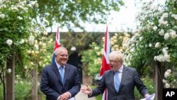보리스 존슨 영국 총리와 스콧 모리슨 호주 총리가 15일 런던 총리관저에서 회담했다.