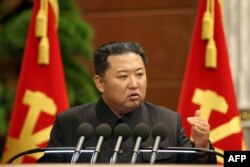 FILE - North Korean leader Kim Jong Un speaks at the office of the Party Central Committee in Pyongyang in this picture taken September 2, 2021 and released from North Korea's official Korean Central News Agency. (Photo by STR/KCNA via KNS/AFP)