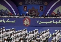FILE - Iranian President Hassan Rouhani delivers a speech during a National Army Day parade in Tehran, Iran, Sept. 22, 2019. (WANA via Reuters)