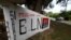 A graffiti, of rebel group Army Liberation National (ELN) is seen at the entrance of the cemetery of El Palo, Cauca, Colombia, Feb. 10, 2016. 
