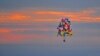 Jonathan Trappe is seen flying is cluster balloon ship on September 12, 2013. (Paul Cyr Barcroft media)