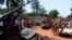 Armed fighters from the Seleka rebel alliance patrol the streets in pickup trucks to stop looting in Bangui, March 2013.