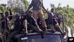 Nigerian troops seen on patrol.