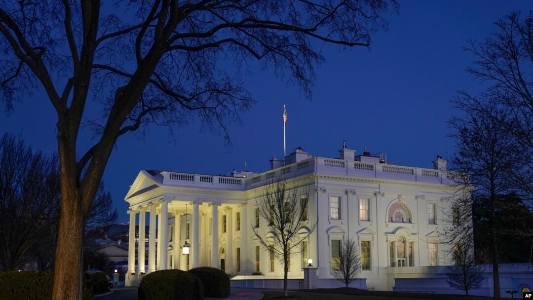 Dusk settles over the White House in Washington, Jan. 23, 2021. 