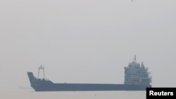 Vessels in the Strait of Hormuz near the beach of Bandar Abbas