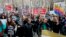 FILE - Protesters chant "Free Daniel" during a demonstration outside the federal courthouse in Seattle, Feb. 17, 2017, where a hearing was held for Daniel Ramirez Medina, a Seattle-area man who was arrested by immigration agents. A federal judge in Seattle has opened the door for thousands of immigrants to apply for asylum, finding that the Department of Homeland Security has routinely failed to notify them of a deadline for filing their applications. 