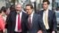 Attorneys Jonathan Blackman (L) and Carmine Boccuzzi (C), lead lawyers representing Argentina in its ongoing debt talks, arrive at federal court for a hearing in New York, August 1, 2014.