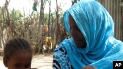 Five year old Hasna with her mother Nehina Mohammed luckily spared from undergoing FGM. Amibara District, Affar (2010)
