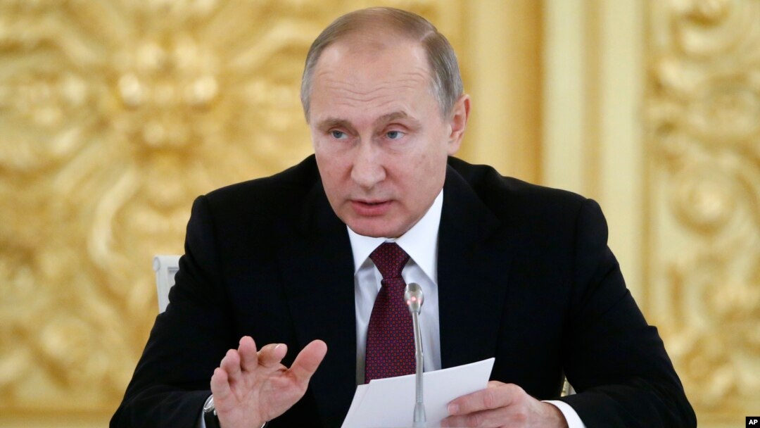 Presiden Rusia Vladimir Putih usai menandatangani doktrin baru mengenai keamanan informasi, Kamis (8/12).