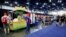 Food vendors and tables occupy the area where Daniel Defense was to have its booth at the National Rifle Association annual meeting in Houston, May 27, 2022. Daniel Defense, maker of the \rifle used in the Uvalde, Texas, shooting, pulled out of the convention after the shooting.