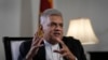 Sri Lanka's new prime minister Ranil Wickremesinghe gestures during an interview with The Associated Press in Colombo, Sri Lanka, June 11, 2022.