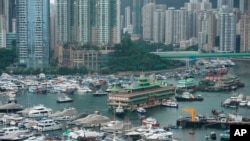 Hong Kong's iconic Jumbo Floating Restaurant is towed away in Hong Kong, June 14, 2022.
