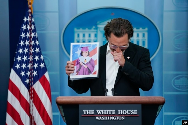 Actor Matthew McConaughe reacts as he holds an image of Alithia Ramirez, 10, who was killed in the mass shooting at an elementary school in Uvalde, Texas, as he speaks during a press briefing at the White House, June 7, 2022, in Washington. (AP Photo/Evan Vucci)