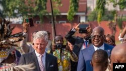 Belgium's King Philippe (C-L) and President of the Democratic Republic of the Congo Felix Tshisekedi (C-R) are seen upon his arrival at the N'djili International Airport in Kinshasa on June 7, 2022.