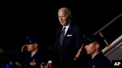 President Joe Biden walks down the steps of Air Force One at Dover Air Force Base, Del., Thursday, June 2, 2022, as he heads to Rehobeth Beach, Del., for the weekend. 