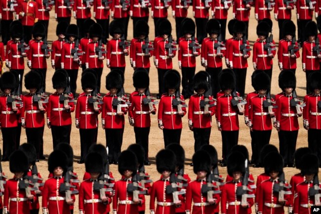 Members of the Household division take part in the Trooping the Colour parade at Horse Guards, in London, Thursday, June 2022. (AP Photo/Matt Dunham)