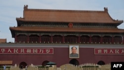 Policemen stand guard in front of the Tiananmen Square in Beijing on June 4, 2022, during the 33rd anniversary of the 1989 crackdown on pro-democracy protests.