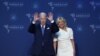 U.S. President Joe Biden, accompanied by first lady Jill Biden, waves as he arrives to greet leaders during the Summit of the Americas, in Los Angeles, California, June 8, 2022.