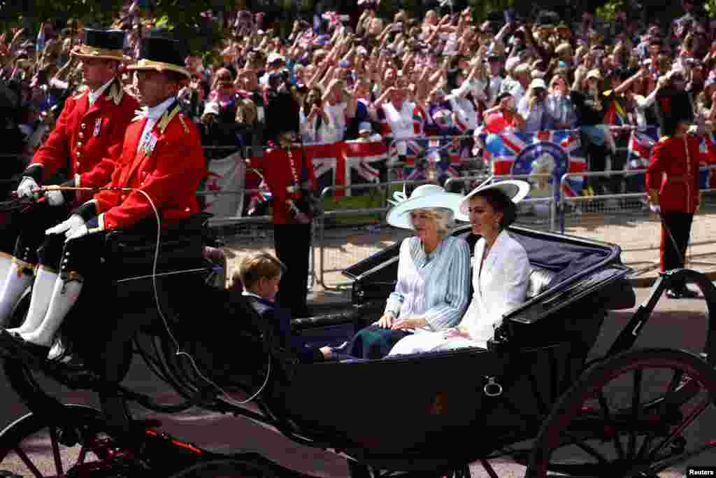 Britain&#39;s Catherine, Duchess of Cambridge and Camilla, Duchess of Cornwall ride in a carriage during the Trooping the Color parade in celebration of Britain&#39;s Queen Elizabeth&#39;s Platinum Jubilee in London, June 2, 2022.