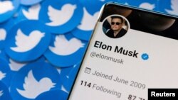 FILE - Elon Musk's profile picture is seen on his Twitter account in this illustration photo.