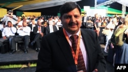 FILE - In this file photo taken on December 16, 2012 Atul Gupta attends the 53rd national conference of the African National Congress in Bloemfontein. Atul Gupta and his brother Rajesh Gupta were arrested on Tuesday in Dubai and are to be handed to South African authorities. 