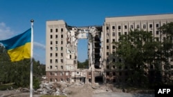 This photograph taken on June 10, 2022, shows the regional government building destroyed by a Russian missile strike in March 2022, in the southern Ukrainian city of Mykolaiv, amid the Russian invasion of Ukraine.