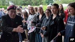 British veteran Bill Gladden arrives at the ceremony at Pegasus Bridge, in Ranville, Normandy, June, 5, 2022.