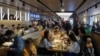 People visit the new restaurant "Vkusno & tochka", which opens following McDonald's Corp company's exit from the Russian market, in Moscow, June 12, 2022. 