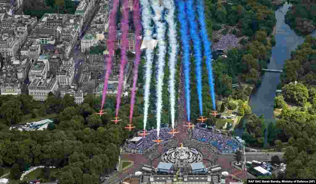 The Red Arrows during a flypast after the Trooping the Color ceremony in London, June 2, 2022, on the first of four days of celebrations to mark the Platinum Jubilee.