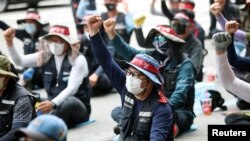 Members of the Cargo Truckers Solidarity union take part in a protest in front of Kia Motor's factory tin Gwangju, South Korea, June 10, 2022. 