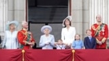 Camilla, the Duchess of Cornwall, Prince Charles, Queen Elizabeth II, Kate, Duchess of Cambridge, Prince Louis, Princess Charlotte, Prince George, and Prince William watch from the balcony of Buckingham Place after the Trooping the Color ceremony in London.