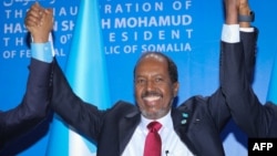 Somalia's new president Hassan Sheikh Mohamud celebrates during his inauguration as his country's 10th president in Mogadishu, Somalia, on June 9, 2022. 