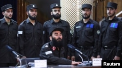 Afghan Taliban's Interior Ministry Spokesman Abdul Nafi Takor speaks at a news conference about the new Afghan police uniform in Kabul, Afghanistan, June 8, 2022. 