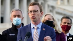 FILE - U.S. Rep. Dusty Johnson, R-S.D., speaks during a news conference, Dec. 21, 2020, on Capitol Hill in Washington.