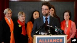 FILE - Paul Kramer, the citizen sponsor of an initiative which increased restrictions on the purchase and ownership of firearms, speaks about efforts in Washington state to reduce gun violence on Feb. 14, 2019, in Seattle.