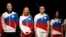 Athletes display the Olympic uniforms for Russian athletes in Moscow, April 14, 2021. The Olympic kit for the Tokyo Games, will not depict any symbols of the country.