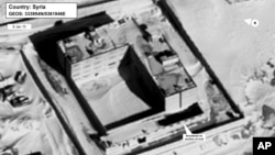 This image provided by the State Department and DigitalGlobe, taken Jan. 15, 2015, a satellite image of what the State Department described as a building in a prison complex in Syria that was modified to support a crematorium. 