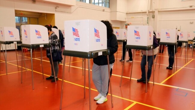 FILE - Maryland voters cast their ballots at the Pip Moyer Recreation Center in Annapolis, Md., Nov. 3, 2020.