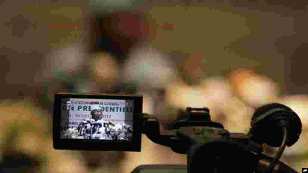 Olusegun Obasanjo, Nigeria's former president who is heading an African Union observation mission on the Senegalese elections, makes a statement during a press conference, in Dakar, Senegal Saturday, Feb. 25, 2012.