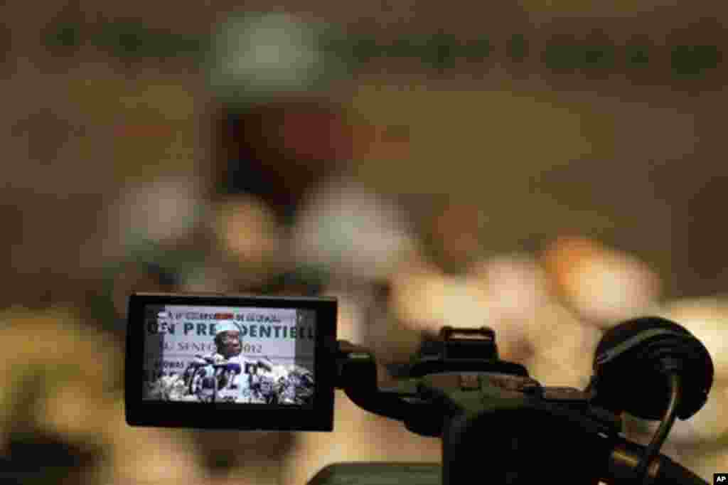 Olusegun Obasanjo, Nigeria's former president who is heading an African Union observation mission on the Senegalese elections, makes a statement during a press conference, in Dakar, Senegal Saturday, Feb. 25, 2012.