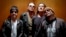FILE - Members of the Mexican rock band Maná, drummer Alex González, from left, vocalist Fher Olvera, bassist Juan Calleros and guitarist Sergio Vallín pose during an interview in New York, Oct. 25, 2016.
